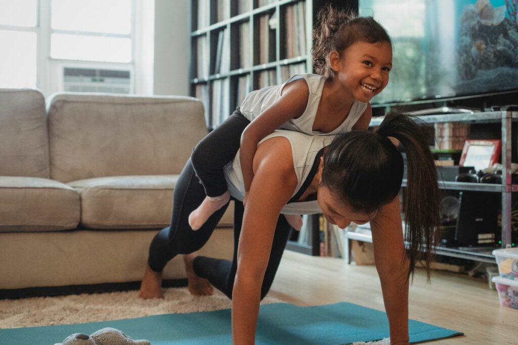 mom working out with child