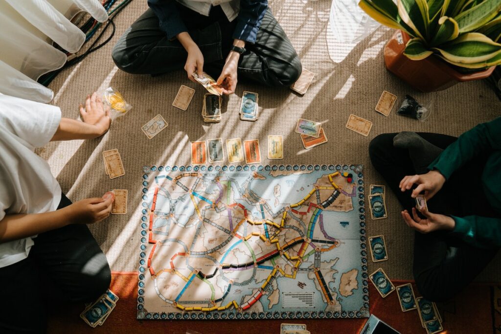 people playing board game