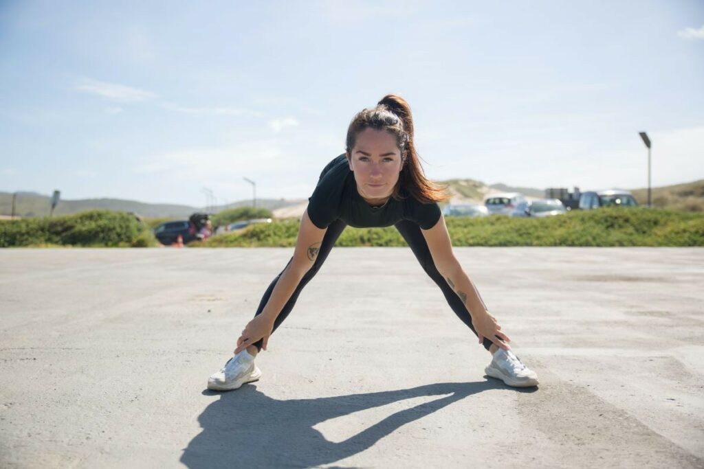 person stretching outside