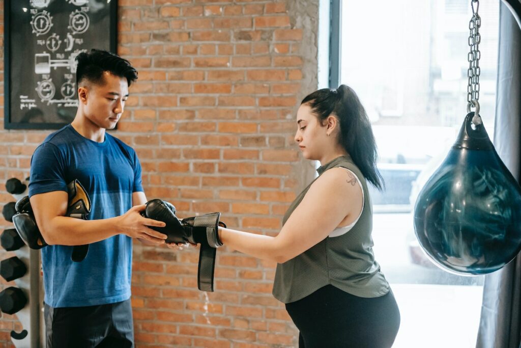 person boxing at gym