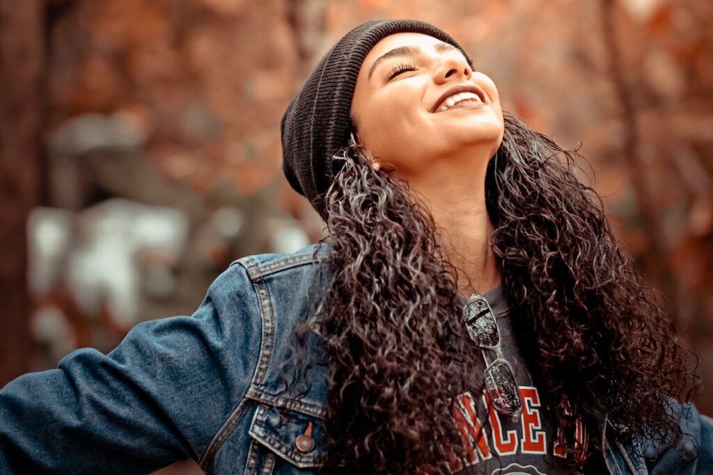 person happy in fall weather