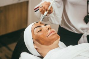 person with face mask at spa