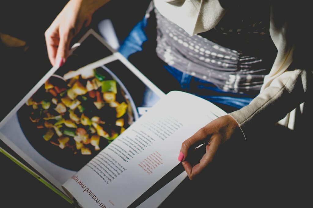 person reading cookbook