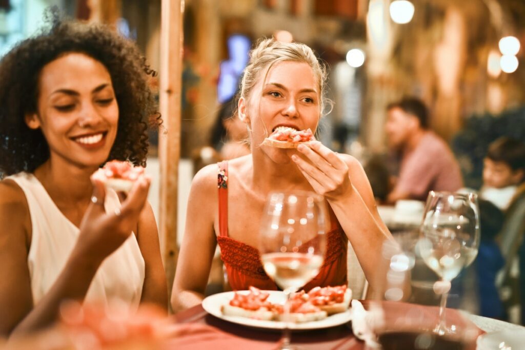 people eating dinner at restaurant