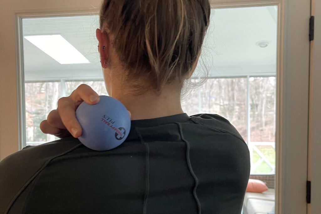 person performing self-myofascial release