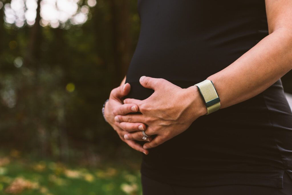 person wearing whoop pregnancy tracker