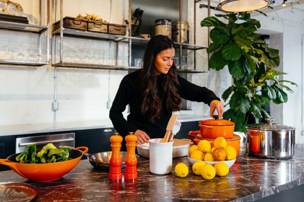 person preparing healthy food in kitchen